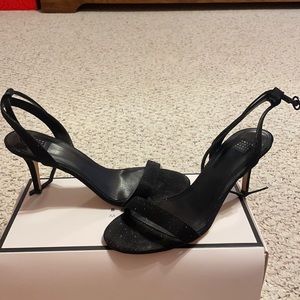 Strap and glitter sandals.